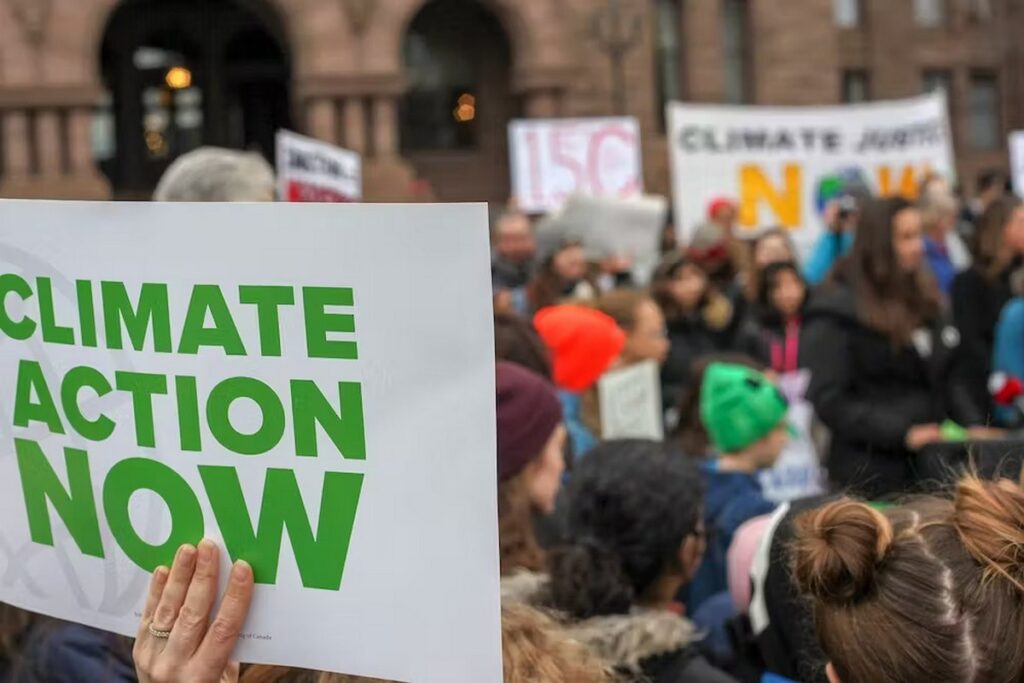 Climate action protest sign